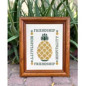 Vintage handmade cross-stitch pineapple welcome sign
